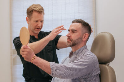 Patient during consultation with Dr. Kulbersh for treatment in Charlotte