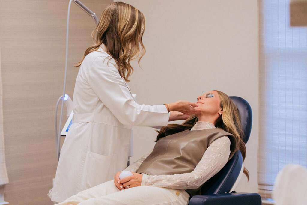woman receiving skin treatment procedure