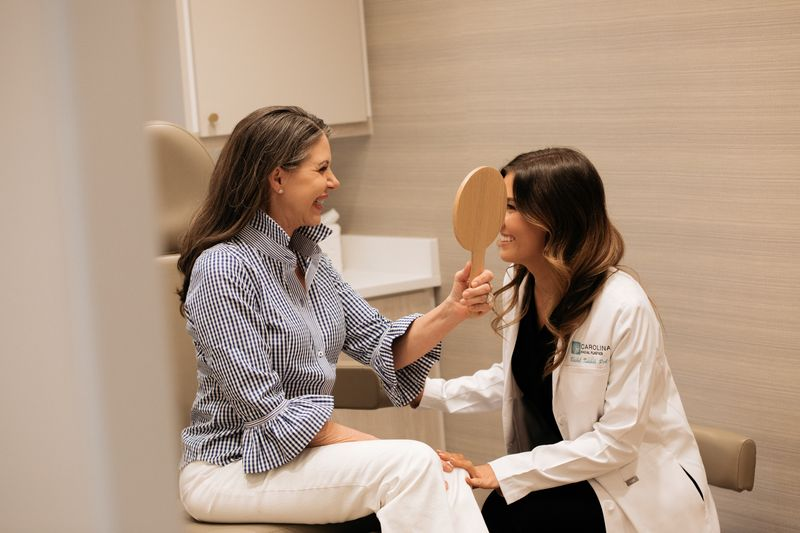 Carolina facial plastic surgery in action shot with a patient